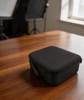 Rugged Oxford Cloth Telescope Accessory Case With Removable Dividers for eyepieces and optics gear on a wooden table.