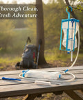 4-Piece Hydration Bladder Cleaning Brush Set for Water Reservoirs and Drinking Tubes on picnic table in nature setting