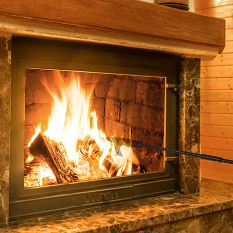 36 Inch Heavy Duty Fire Poker for Fire Pit and Campfire Use Heat Resistant Handle Solid Steel Fire Pit Tool in action at fireplace