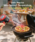 Infrared Temperature Gun For Cookin And Grillin With Adjustable Emissivity used near grill with pizza, 12:1 D:S ratio evident.