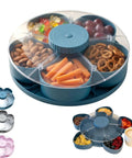 Rotating 5-Compartment Snack Tray With Lid, The Ultimate Spin Serving Tray For Dips, Nuts, Candy And Party Appetizers, Lazy Susan Style Organizer For Kitchen, Travel, And Picnic (Blue), displaying snacks in compartments with a clear lid.