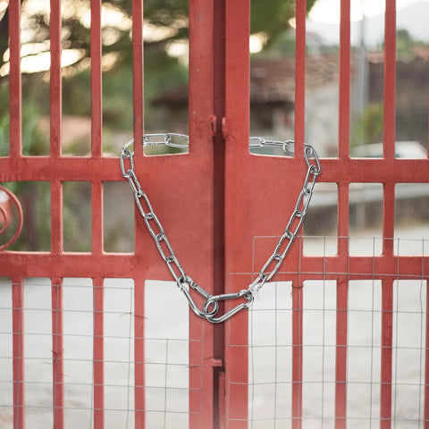 20 Inch Heavy Duty Stainless Steel Gate Chain Lock With Dual End Carabiners For Outdoor Fences Pet Cages And Corral Use installed on a red gate