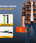 Man holding 4500 PSI PCP Air Compressor For Airguns And Paintball Tanks With Fast Fill And Auto Shut Off Dual Power 12V DC Or 120V AC