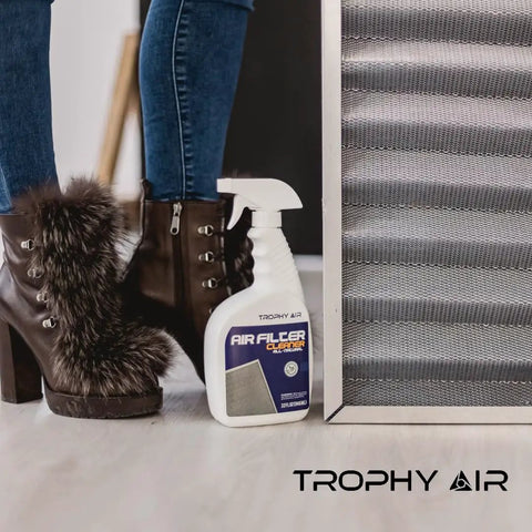 HVAC Filter Cleaner 32 Oz Spray Bottle next to air filter, powerful dirt dissolving formula, restores performance, Trophy Air brand