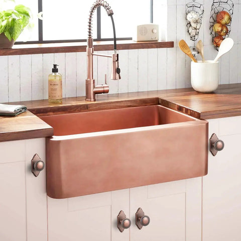 6 Pack Antique Copper Cabinet Knobs With Backplates installed on white kitchen cabinets with copper sink and faucet