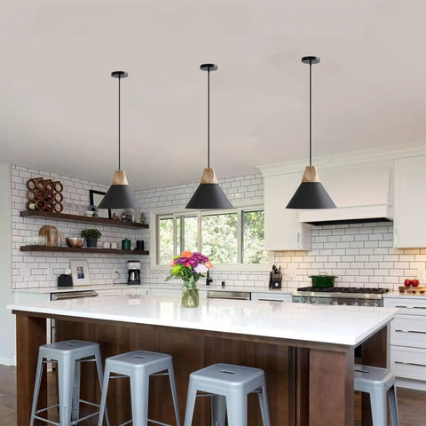 Solid Wood Matte Black Pendant Lights Three Pack For Kitchen Island And Dining Room Modern Ceiling Hanging Lamps For Bar And Coffee Bar Minimalist Wood And Metal Design Warm Ambience in modern kitchen setting