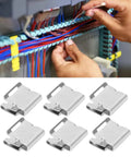 Heavy Duty 304 Stainless Steel Solar Panel Cable Clips 100 Pack used for organizing wires in an electrical panel installation.