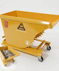 Built Tough 1.5 Yard Self Dumping Hopper With Smooth Rolling Casters And Six Thousand Pounds Capacity, yellow, for easy material disposal.
