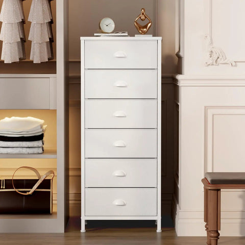 White tall dresser with vertical storage tower and end table featuring six fabric drawers and drawer organizer