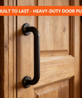 Rock Solid 12 Inch Industrial Pipe Wall Mount Grab Bar For Stairs Decks And Entryways Featuring Heavy Duty Galvanized Steel Non Slip Matte Black Support Built To Last mounted on a wooden door.