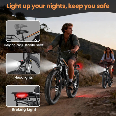 Riders on Fat Tire Electric Beast Bike With 1500W Peak Motor 48V 15Ah Battery on a dirt trail at dusk with headlights on