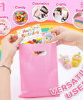 Pink bag from 50 Pack Multicolor Party Favor Gift Bags 8x11 Inches With Handles Reusable Plastic Goodie Bags for candy and gifts