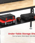 Under-table storage shelf of Flat Out Heavy Duty 60 Inch Workbench And Adjustable Height Stand holding tool cases and equipment.