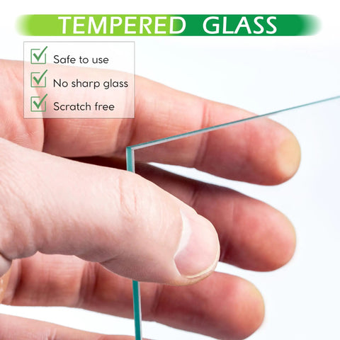 Close-up of hand holding tempered glass from Two Pack Black Wooden Picture Frames For 16x20 To 11x14 Mat Opening 10.5x13.5 With Tempered Glass And Modern Matte Finish, Ideal For Photos Posters Certificates And Wall Decor, Gallery Ready showing safety features.