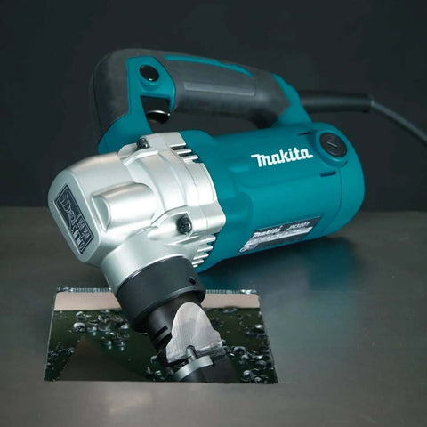 Low Noise 10 Gauge Metal Nibbler With Lock On Trigger cutting metal sheet, 7.4 lb tool, rubber grip, built-in thickness gauge visible