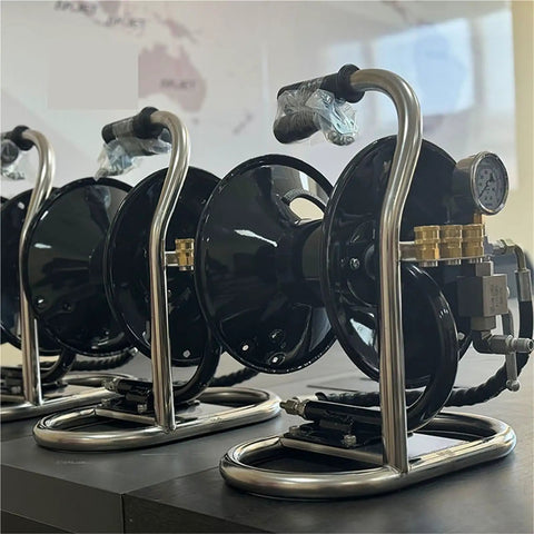 Killer Heavy Duty Workhorse Rotating Water Spray Featuring One Hundred Foot Telescopic Manual Hose Reel with pressure gauge and metal reels.