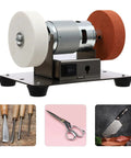 Heavy Duty Mini Belt Sander, Kickass Electric Benchtop Grinder With Dual Coarse And Fine Wheels on a sturdy base, suitable for crafting and sharpening.