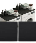 Set Of Two 25X25 Inch Washer And Dryer Top Protector Mats To Keep Your Laundry Space Straight Up Slick With Durable Nonslip Surface And Spacious Flat Shelf with stacked towels and containers.