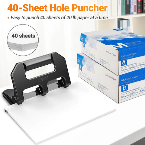 Heavy Duty 3 Hole Puncher For Binders With 40 Sheet Capacity, metal construction, black finish, alongside reams of paper.