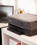 All In One Wireless Inkjet Printer Print Copy Scan With Alexa 1.44 Inch Oled Display on desk beside laptop.