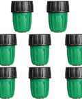 Eight pack three quarters inch to one half inch faucet adapters for drip irrigation, green and black twist-lock design.