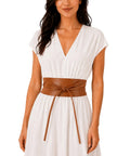 Women Italian Leather Obi Belt In Rich Camel Buttery Soft Full Grain Cowhide Wide Waist Sash for midi dresses, worn by model.
