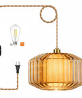 Plug In Dimmable Pendant Light Featuring Amber Drum Glass And Gold Fabric Inner Shade, vintage swag hanging lamp with exposed bulb.