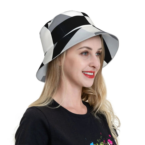 Fire Black And White Piano Grid Print Bucket Hat With Double Sided Reflective Trim unisex hat worn by a woman, side view.