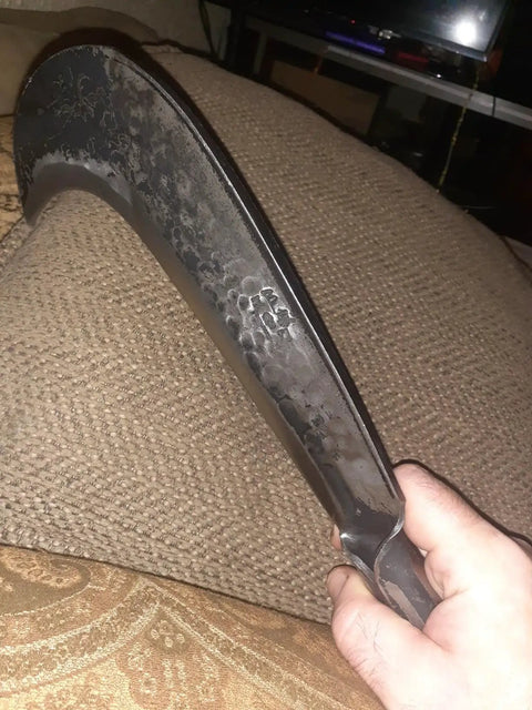 Close-up of Heavy Duty Machete Billhook Sickle Knife For Yard Work And Tree Cutting, showcasing curved manganese steel blade.