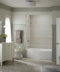 Bathroom featuring Forte Sculpted Rite-Temp Bath And Shower Valve Trim With Slip-Fit Spout And 2.5 GPM Showerhead in polished chrome.