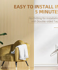 Beige One Cord Cable Hider Kit for Walls, 85 Inch Cord Covers installed by a chair, showcasing easy mount setup with no drilling.