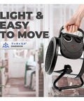 Person holding Palma Electric Greenhouse Heater And Fan With Digital Thermostat, Dual 750W And 1500W Elements, stainless steel.