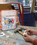24/7 first aid kit in clear plastic case with orange latches; 336 pieces, front view