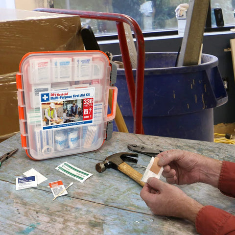 24/7 first aid kit in clear plastic case with orange latches; 336 pieces, front view