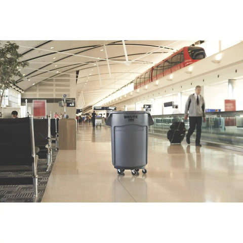 Heavy Duty 44 Gallon Gray Trash Can With Dome Top And Snap Lock Industrial Workhorse Waste Bin Built Rock Solid Stackable Commercial Storage Container Made In Usa in airport setting.