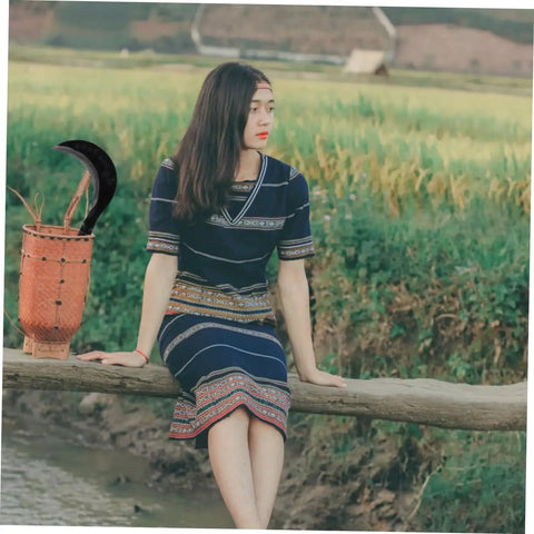 Woman sitting on fence with basket and Durable Manganese Steel Scythe Long Hand Hoe For Garden Weeding Heavy Duty Yard Work Hand Weeder Tool