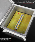 Waterproof outdoor junction box with lid open, heavy metal enclosure and yellow terminal block inside.