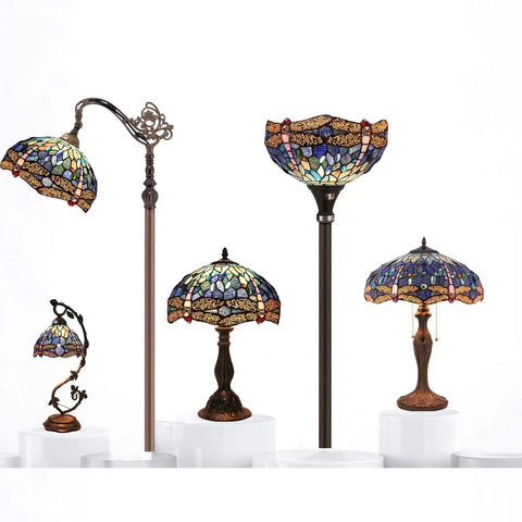Tiffany style dragonfly blue stained glass table lamp displays intricate design with antique green bronze base in various light formats.