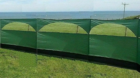 Forest Green 5 Panel Wind Privacy Screen Windbreaker For Camping, Garden Or Beach, outdoors with sea view, 5ft high, 27.4ft long.