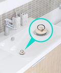 Four Pack Stainless Steel Sink Strainers With Rubber Stopper Plug Set Fits 2.125 Inch Top Diameter And 1 Inch Basket Ideal For Bathroom Utility Slop Laundry RV Lavatory Sinks installed in white bathroom sink.