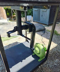 Variable Speed 110V 240CFM Forge Blower Fan With Airflow Controller, shown installed in a metal frame outdoors.