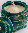 Durable Ceramic Rice Jar And Large Tea Storage Container With Massive Capacity For Keeping Coffee Beans Grain Flour And Cereal Fresh While Dropping Clean Looks On Your Counter with rice being poured in.