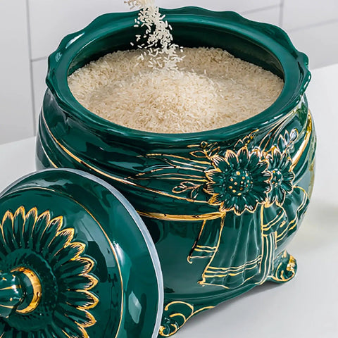 Durable Ceramic Rice Jar And Large Tea Storage Container With Massive Capacity For Keeping Coffee Beans Grain Flour And Cereal Fresh While Dropping Clean Looks On Your Counter with rice being poured in.