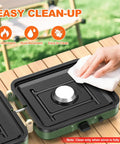 Cleaning surface of Two Burner Foldable Camping Stove With Carry Bag For Outdoor Cooking on wooden table