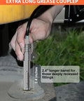 Hand holding extra long grease gun coupler for tight spots with two point four inch nozzle high pressure 10000 PSI quick lock release