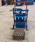 Heavy Duty Concrete Block Making Machine Adjustable Brick Press For Commercial Workshop Use High Volume Output with produced blocks.