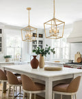 Built Tough Industrial Four Light Chandelier With Killer Gold Lantern Pendant And Rustic Metal Cage above kitchen island.