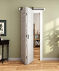 36 By 84 Inch Bifold Barn Door 6 Panel With Three Point Three Foot Hardware Kit Included Ready To Paint Primed Surface Hollow Core And MDF Molded Panels Double 18 By 84 Inch Door Panels DIY Friendly Sliding Barn Door For Your Home installed in hallway