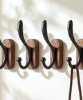 4 Pack Wall Mounted Coat Hooks Heavy Duty Double Design Hang Your Fits Smoothly Premium Walnut Wood Black Metal Frame, close-up view.
