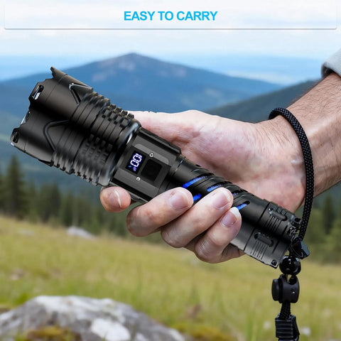 Rechargeable UV Flashlight 3 In 1 Black Light LED Tactical Flashlight in hand outdoors, showing digital display and wrist strap